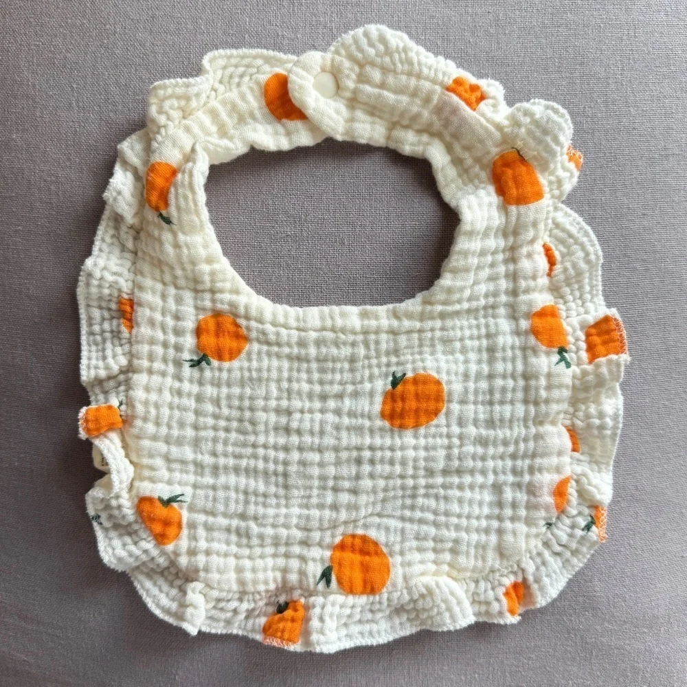 Muslin Ruffle Bib with Oranges